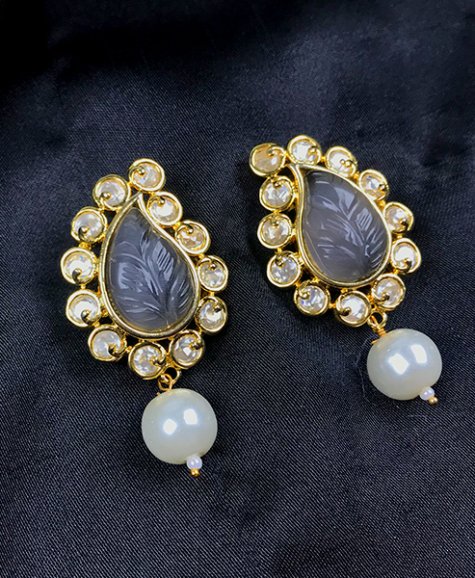 Carved stoned dangling pearl earrings